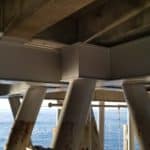 Underdeck steel supports after coating operations