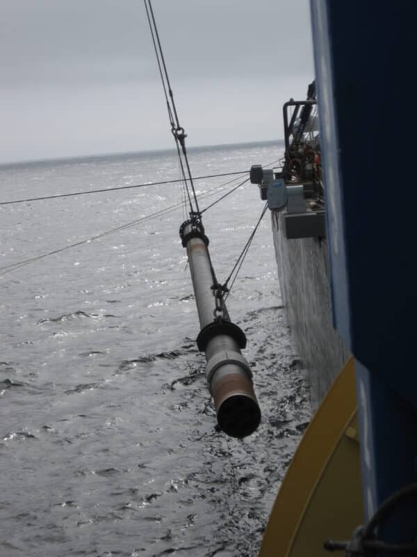 Crane Handing Off I-Tube to Deployment Rigging